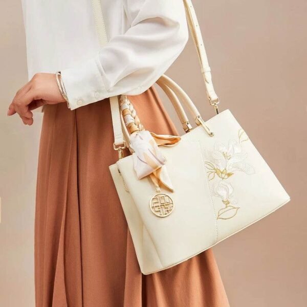 Embroidery_Leather_Magnolia_Leather_Tote_Bag_-_SinoCultural-2474079 Embroidery_Leather_Magnolia_Leather_Tote_Bag_-_SinoCultural-2474079
