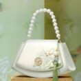 Embroidery_Leather_Vintage_White_Lotus_Handbag_with_Pendant_-_SinoCultural-2476550