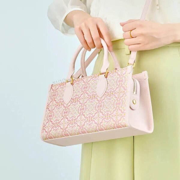 song-brocade-leather-handbag-pink-gold-dingsheng-motif-model-crossbody song-brocade-leather-handbag-pink-gold-dingsheng-motif-model-crossbody